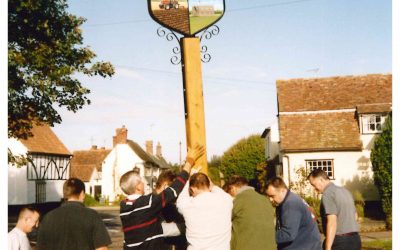 Erecting the village sign, 2004